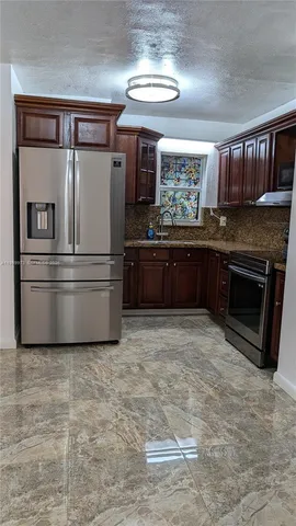 a bathroom with a shower and a toilet