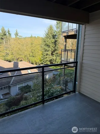 a view of a lake from a balcony
