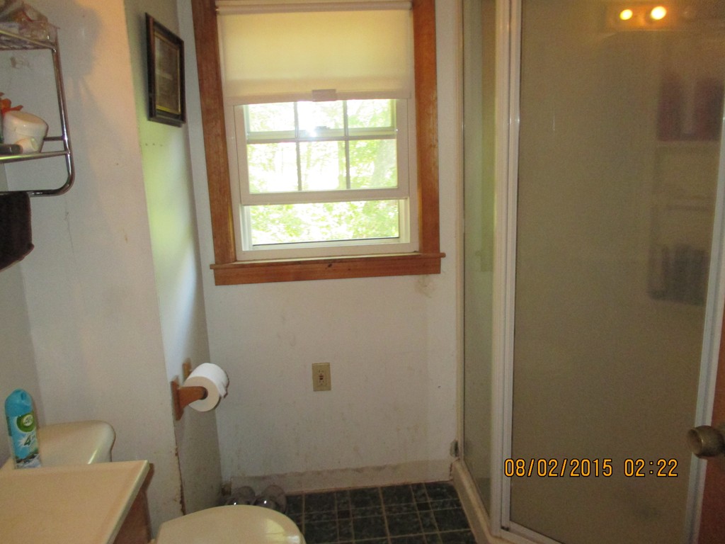 48 Shawsheen Road Billerica, MA 01821 - Photo 11 of 18 a bathroom with a sink and toilet