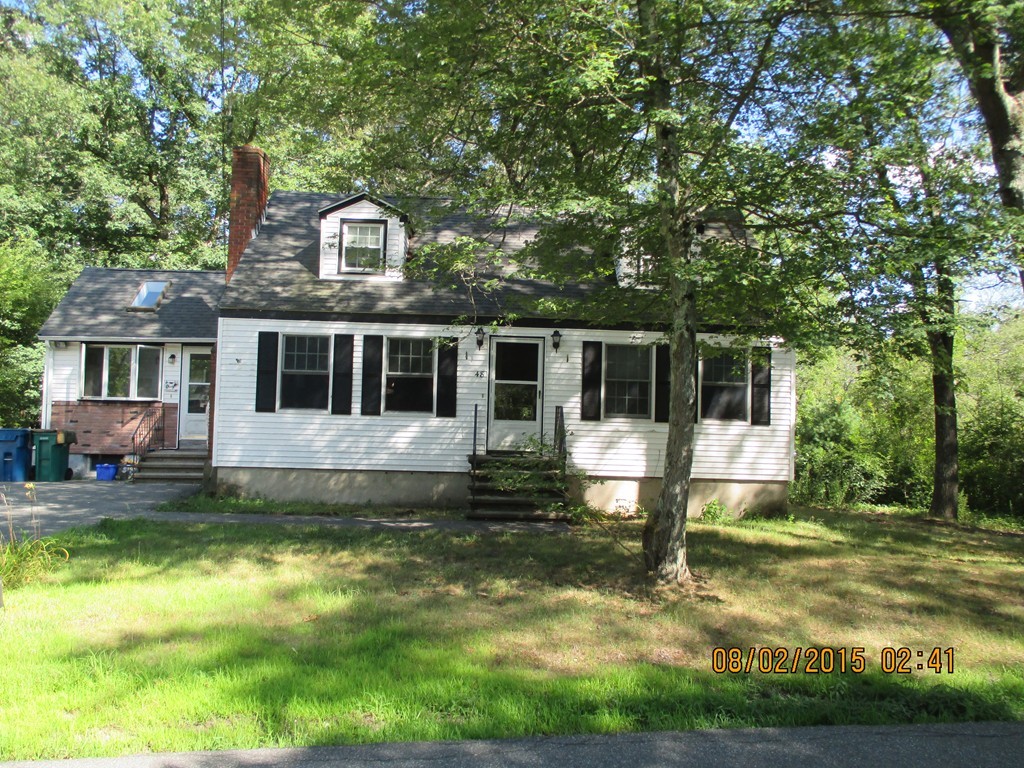 48 Shawsheen Road Billerica, MA 01821 - Photo 2 of 18 a front view of a house with a yard