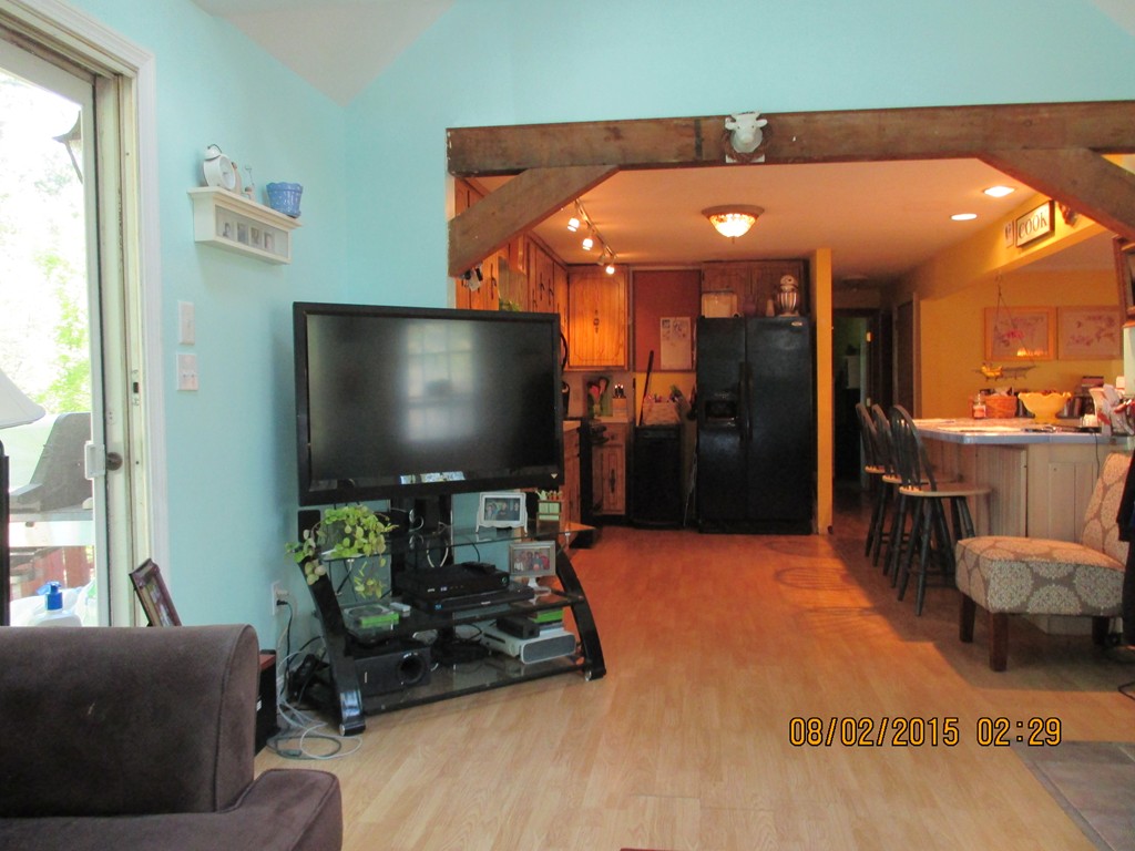 48 Shawsheen Road Billerica, MA 01821 - Photo 5 of 18 a living room with furniture and a flat screen tv