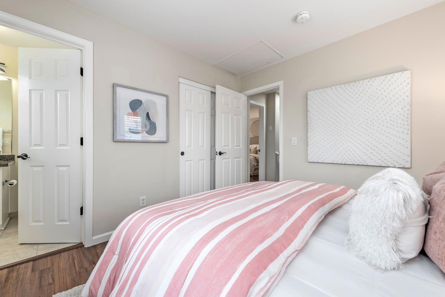 10 Towne Circle Mountain View, CA 94040 - Photo 13 of 28 a bedroom with a bed and a painting on the wall
