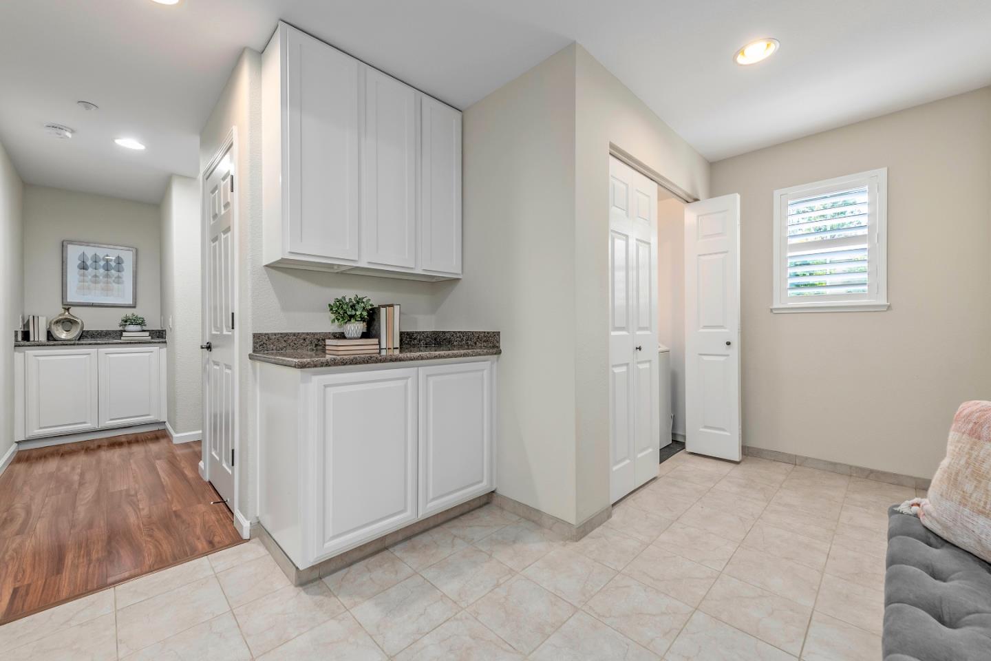 10 Towne Circle Mountain View, CA 94040 - Photo 22 of 28 a kitchen with white cabinets and window