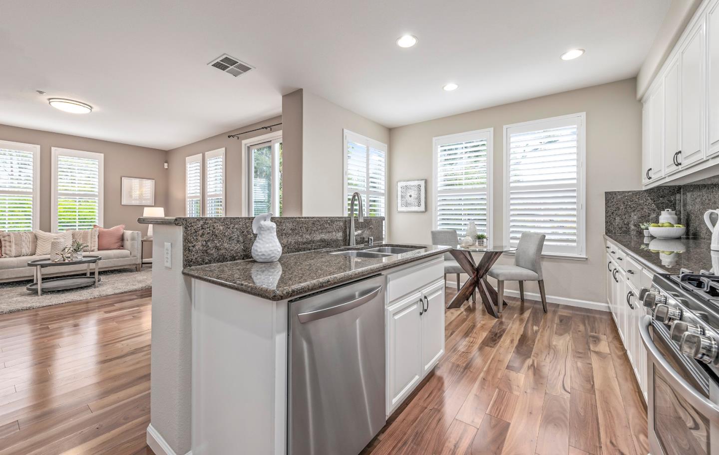 10 Towne Circle Mountain View, CA 94040 - Photo 9 of 28 a living room with furniture a large window and wooden floor