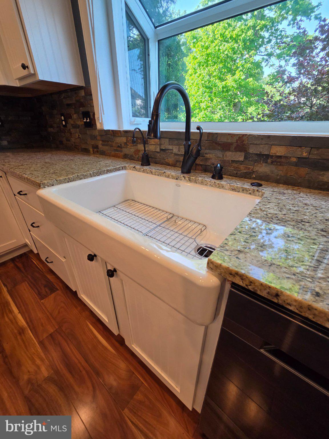 35175 Pheasant Ridge Road Locust Grove, VA 22508 - Photo 31 of 80 Bright kitchen with a farmhouse sink.