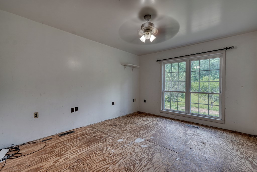 89 Simmons Ridge Mineral Bluff, GA 30559 - Photo 31 of 82 a view of an empty room with a window