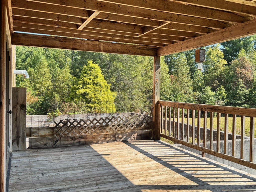 89 Simmons Ridge Mineral Bluff, GA 30559 - Photo 74 of 82 a view of a patio with wooden floor