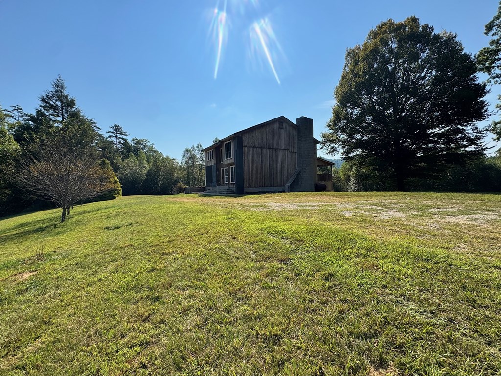 89 Simmons Ridge Mineral Bluff, GA 30559 - Photo 76 of 82 a view of an outdoor space and a yard