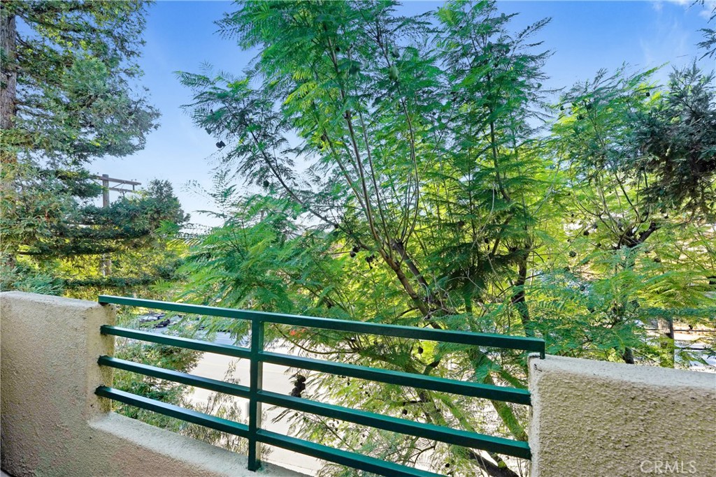 6140 Monterey Road, Unit 406 Los Angeles, CA 90042 - Photo 4 of 26 a view of a wooden fence and trees