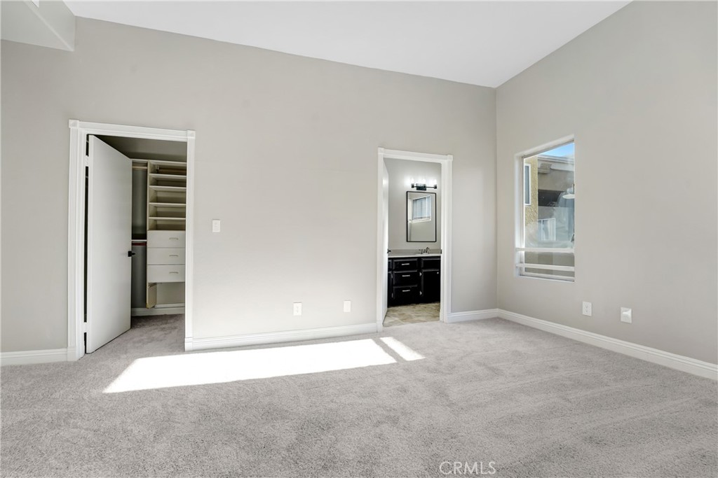 6140 Monterey Road, Unit 406 Los Angeles, CA 90042 - Photo 7 of 26 an empty room with closet and windows