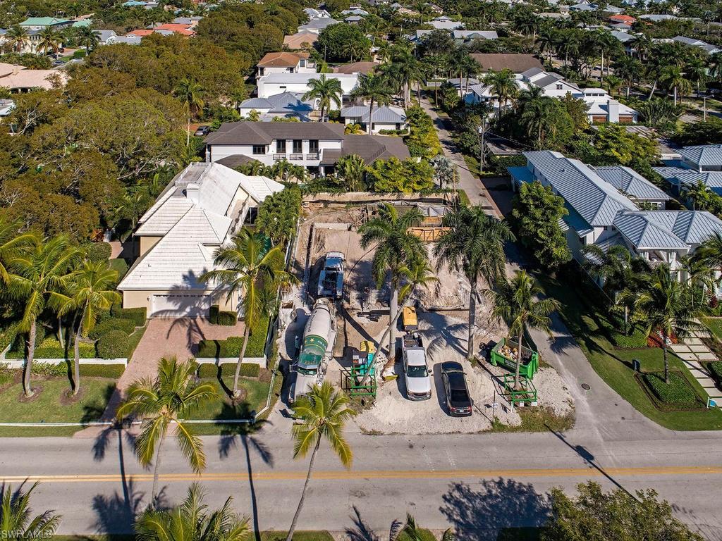 76 3rd Street North Naples, FL 34102 - Photo 3 of 6 an aerial view of residential houses with outdoor space