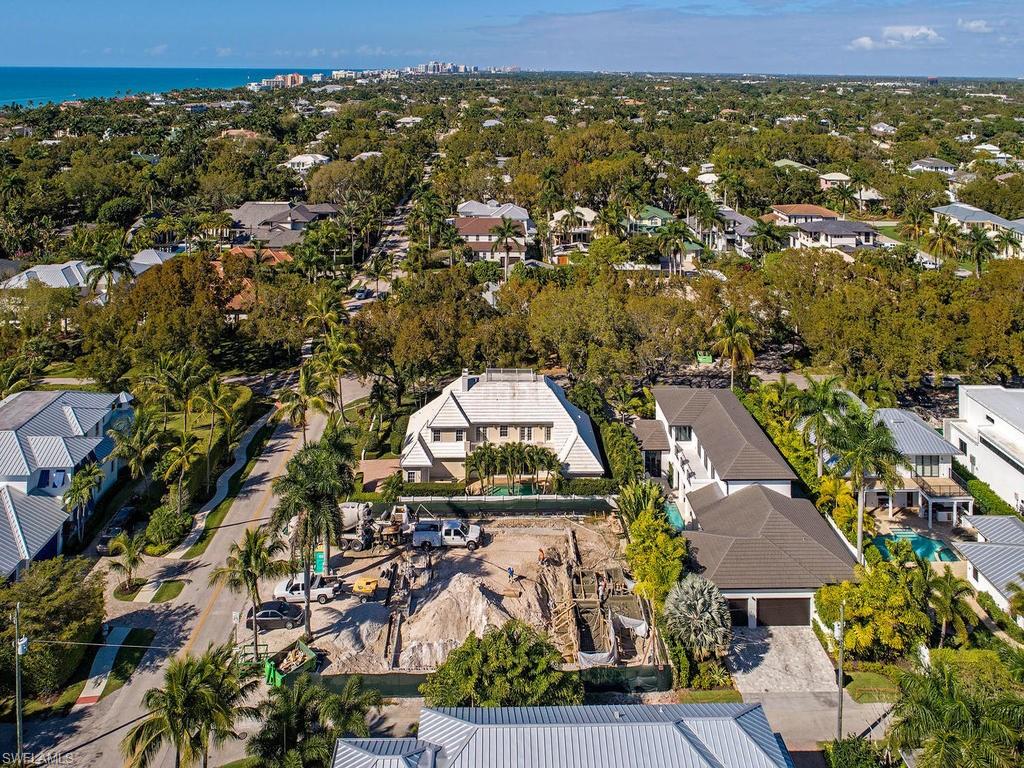 76 3rd Street North Naples, FL 34102 - Photo 4 of 6 an aerial view of residential houses with outdoor space