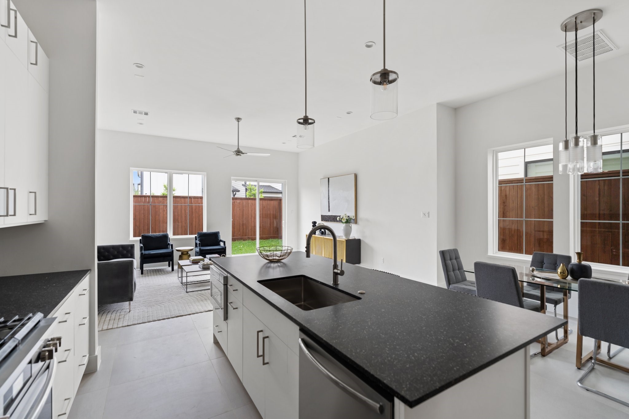 111 East 32nd Street, Unit C Houston, TX 77018 - Photo 12 of 31 Fully equipped with a 36’’ Stainless Steel Gas Range by Frigidaire, Faber 28’’ Range Hood, 36’’ Stainless Steel French door refrigerator/freezer, Microwave drawer in island, and 24’’ Frigidaire dishwasher