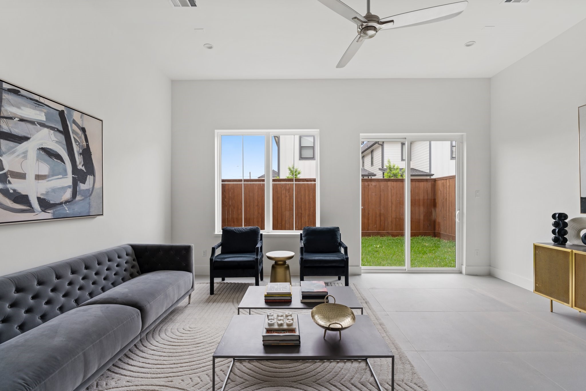 111 East 32nd Street, Unit C Houston, TX 77018 - Photo 3 of 31 Premium designer tile flooring offers timeless elegance and effortless maintenance in the family room