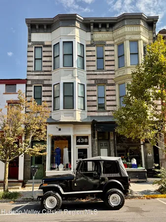 a car parked in front of a building