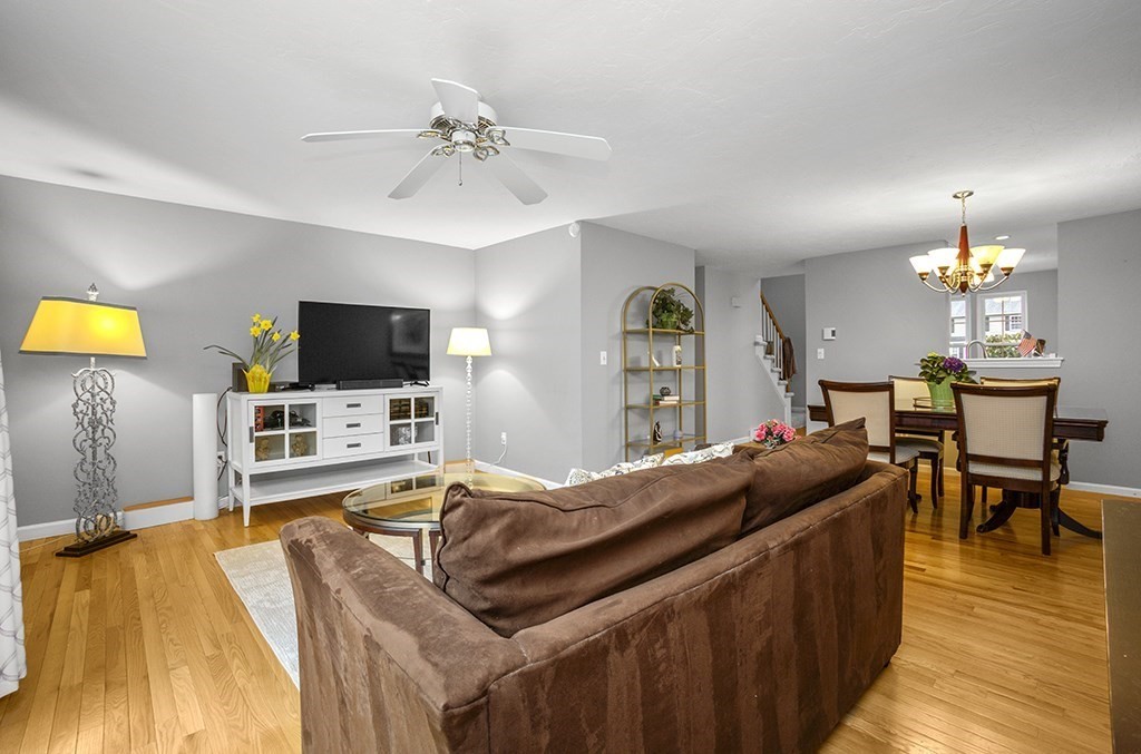 78 Key Street, Unit 78 Millis, MA 02054 - Photo 11 of 33 a bedroom with a bed and a flat screen tv