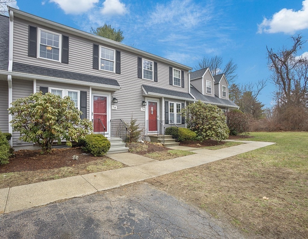 78 Key Street, Unit 78 Millis, MA 02054 - Photo 3 of 33 a front view of a house with garden