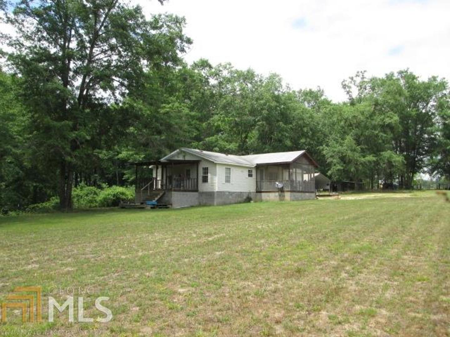 813 Bickley Road Butler, GA 31006 - Photo 1 of 1 a view of a house with a yard