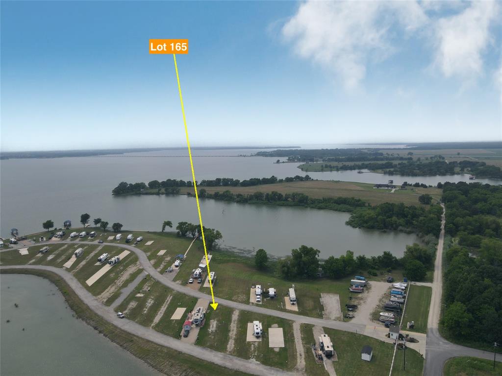 Lot 165 Peninsula Road Kerens, TX 75144 - Photo 18 of 27 a terrace of a house with outdoor seating