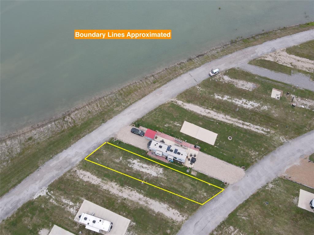 Lot 165 Peninsula Road Kerens, TX 75144 - Photo 5 of 27 a view of a pool with a yard