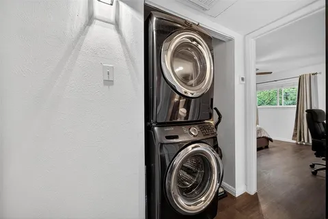 a view of storage and utility room with washer and dryer