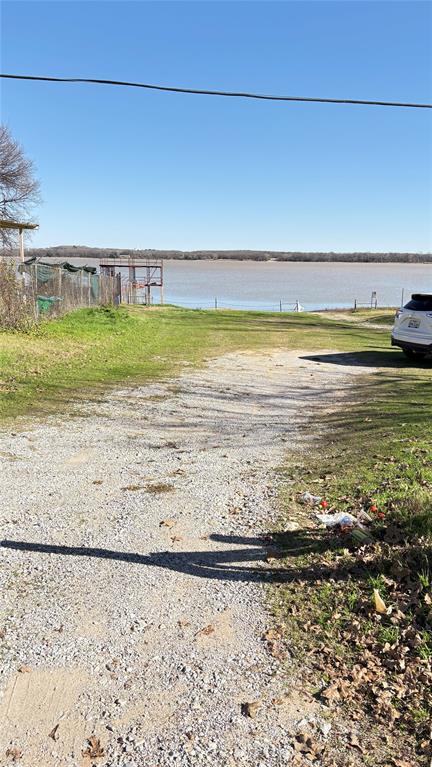 7218 Alcove Street Azle, TX 76020 - Photo 2 of 7 a view of a swimming pool and an outdoor space