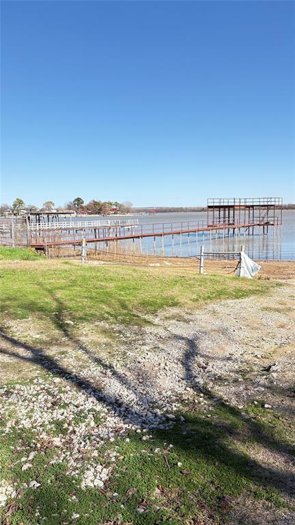 7218 Alcove Street Azle, TX 76020 - Photo 4 of 7 a view of a large body of water with a building in the background