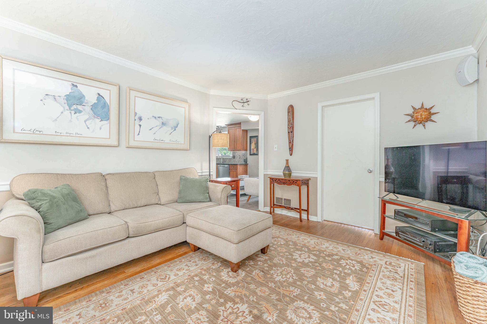 84 North Spring Lane Phoenixville, PA 19460 - Photo 21 of 51 a living room with furniture and a rug