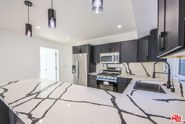 a bathroom with a toilet sink and a bathtub