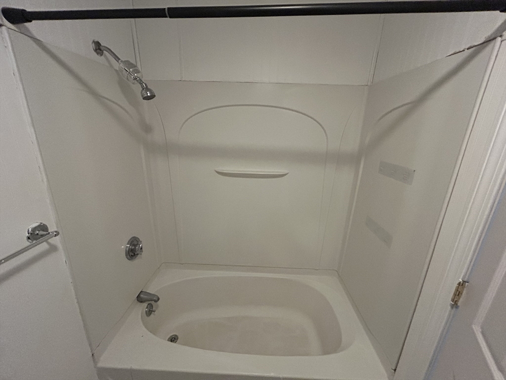 55 P Street, Unit 2 Boston, MA 02127 - Photo 26 of 34 a close view of a bathtub in bathroom