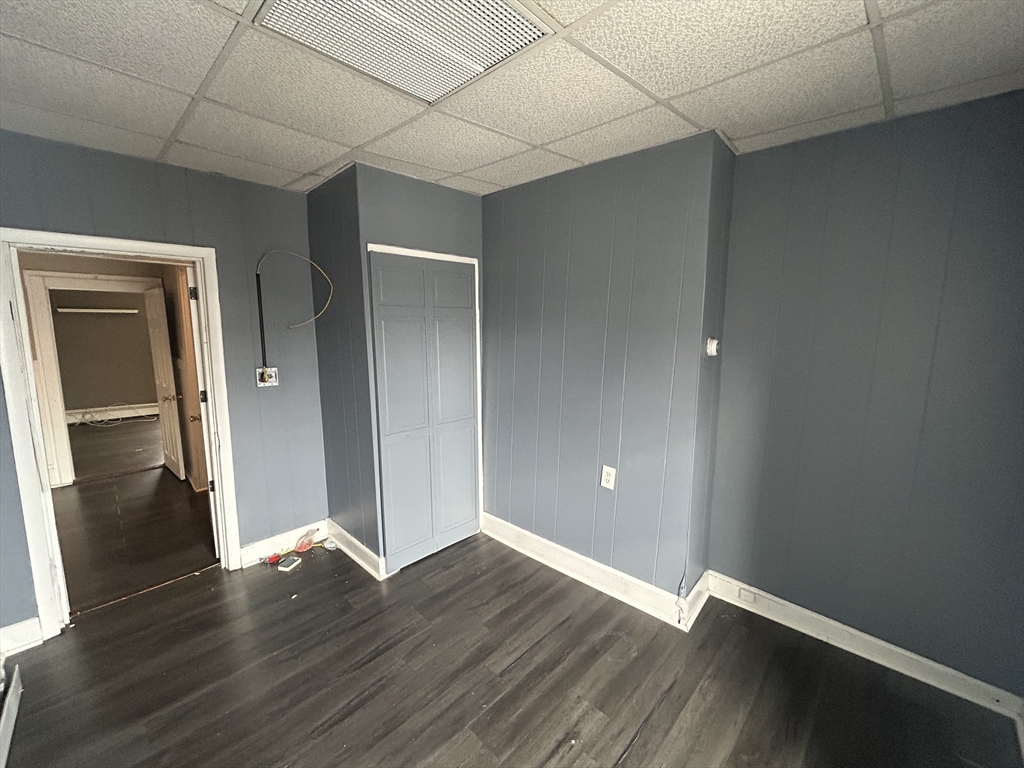 55 P Street, Unit 2 Boston, MA 02127 - Photo 28 of 34 a view of an empty room with wooden floor