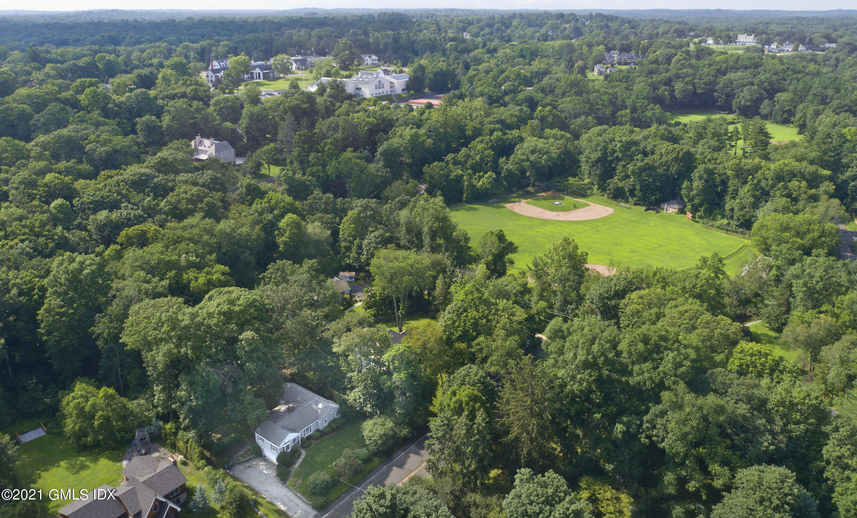 7 Hillside Road Greenwich, CT 06830 - Photo 3 of 7 an aerial view of residential houses with outdoor space and trees