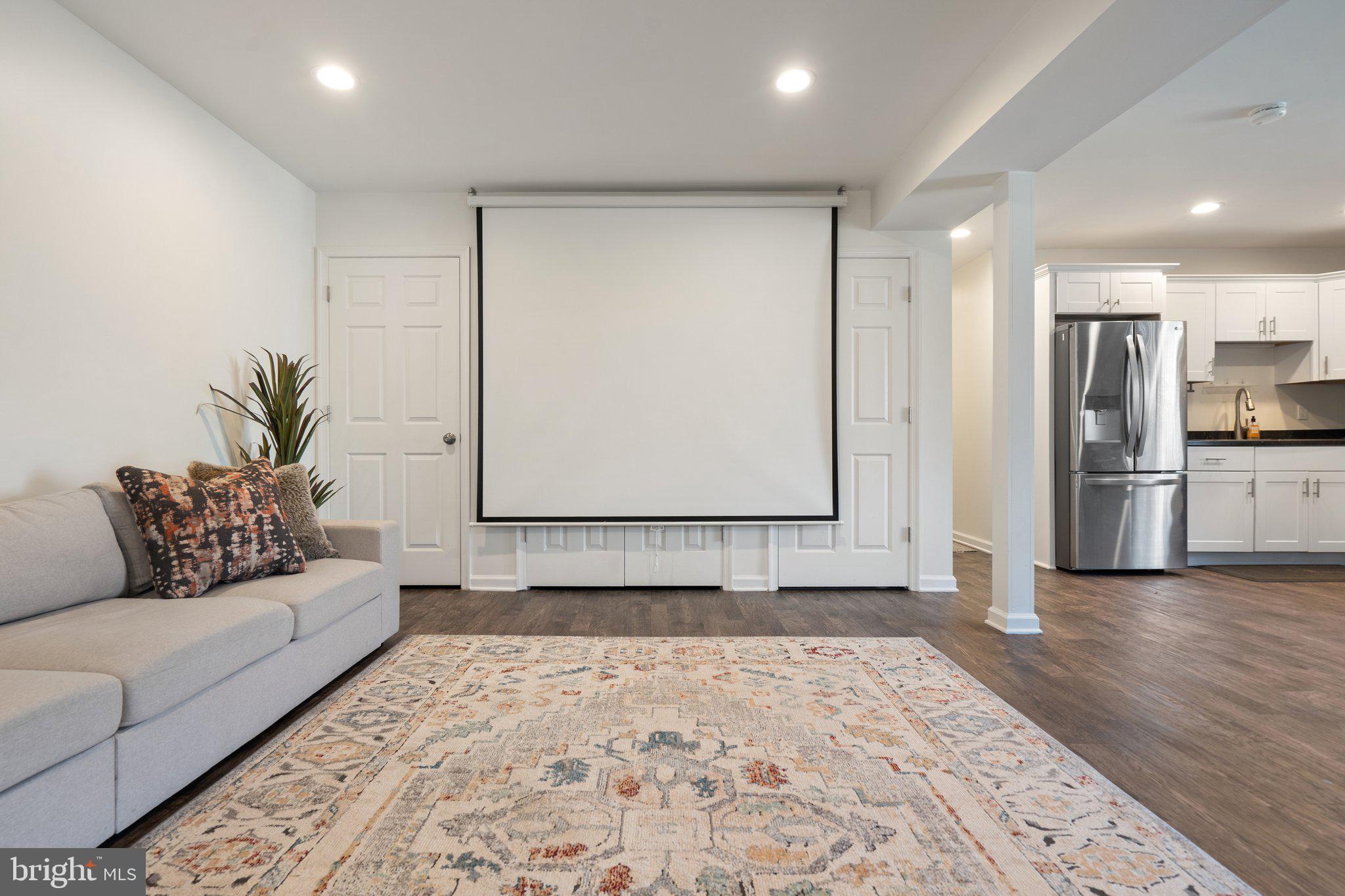 7258 Baldwin Ridge Road, Unit B Warrenton, VA 20187 - Photo 30 of 36 Projector screen