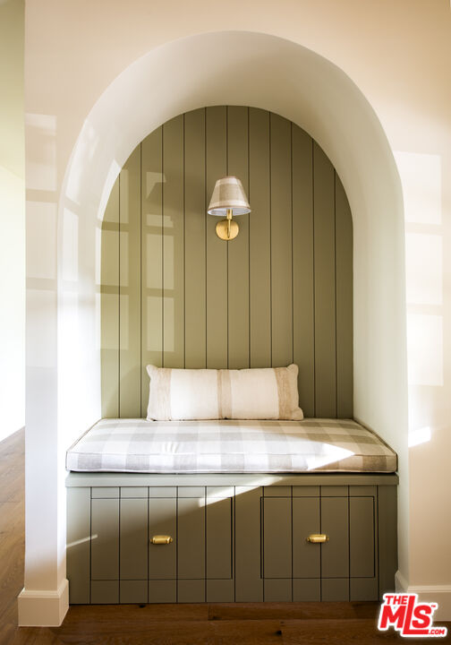 a living room with granite countertop furniture and chandelier