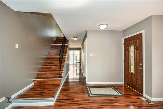 148 Timberlane Road Matteson, IL 60443 - Photo 2 of 23 a view of an entryway with wooden floor