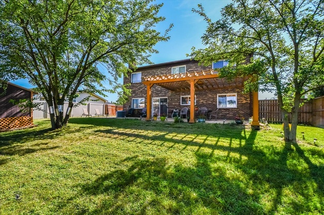 148 Timberlane Road Matteson, IL 60443 - Photo 22 of 23 a front view of a house with garden