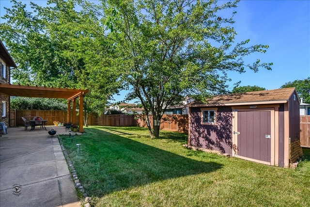 148 Timberlane Road Matteson, IL 60443 - Photo 23 of 23 front view of a house with a yard