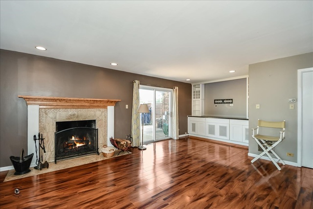 148 Timberlane Road Matteson, IL 60443 - Photo 6 of 23 a living room with furniture and a fireplace