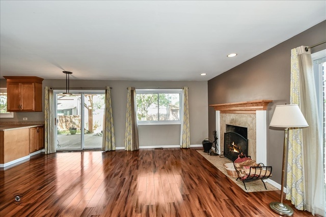 148 Timberlane Road Matteson, IL 60443 - Photo 7 of 23 a living room with furniture and a fireplace