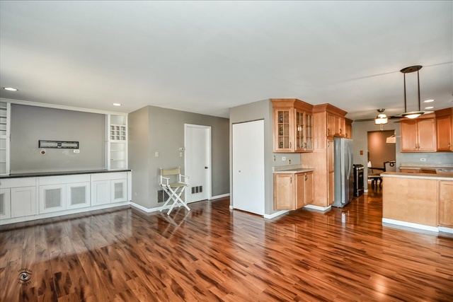 148 Timberlane Road Matteson, IL 60443 - Photo 9 of 23 a living room with stainless steel appliances kitchen island wooden floor and view living room