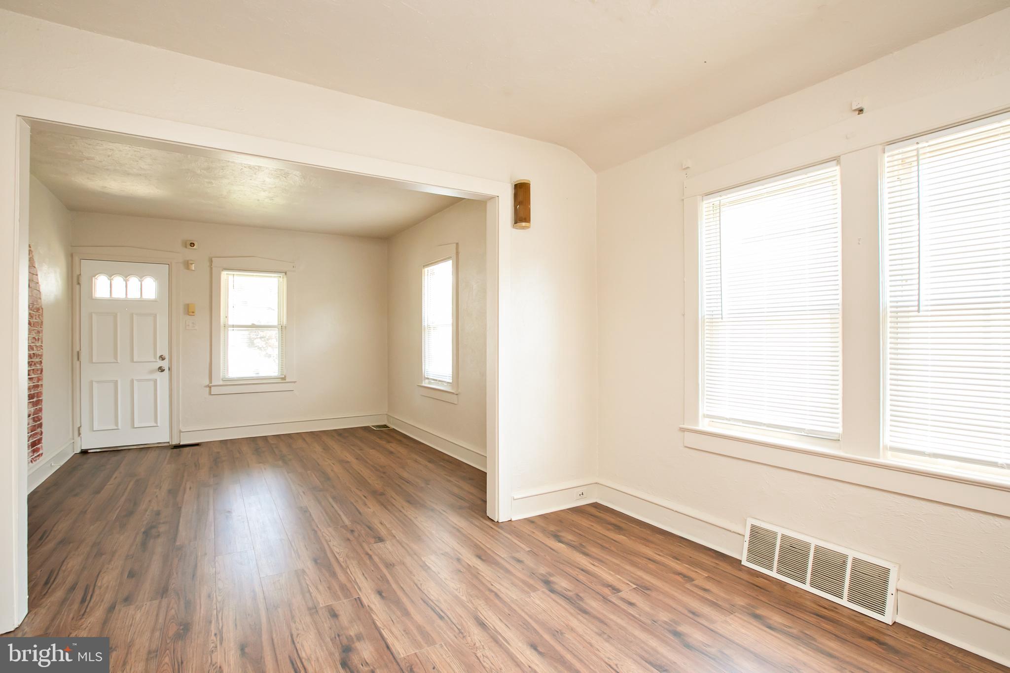 34 Valley Road Mount Ephraim, NJ 08059 - Photo 11 of 39 a view of an empty room with wooden floor and a window