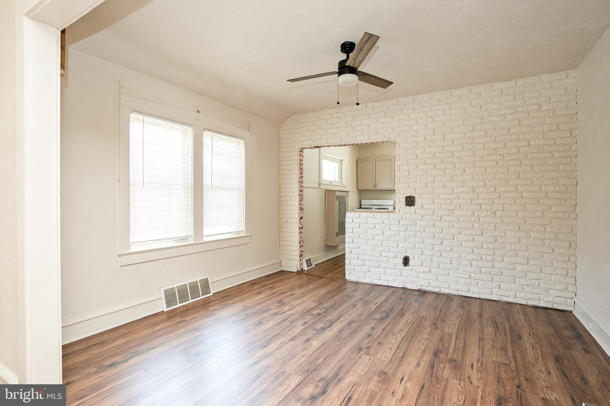 34 Valley Road Mount Ephraim, NJ 08059 - Photo 12 of 39 a view of empty room with wooden floor and window