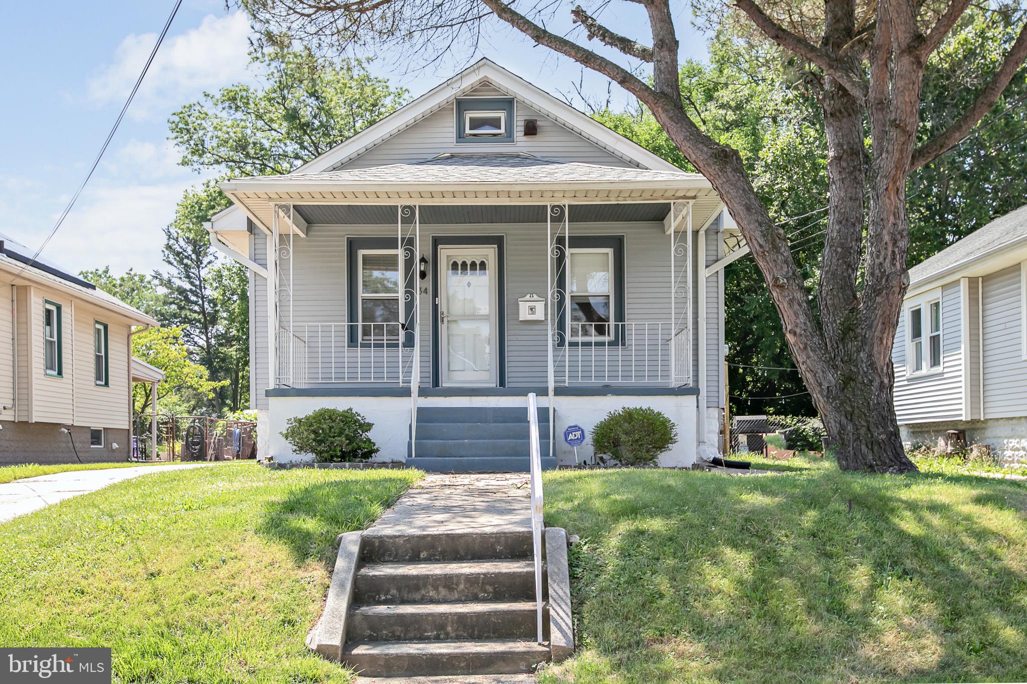 34 Valley Road Mount Ephraim, NJ 08059 - Photo 2 of 39 a front view of a house with a yard