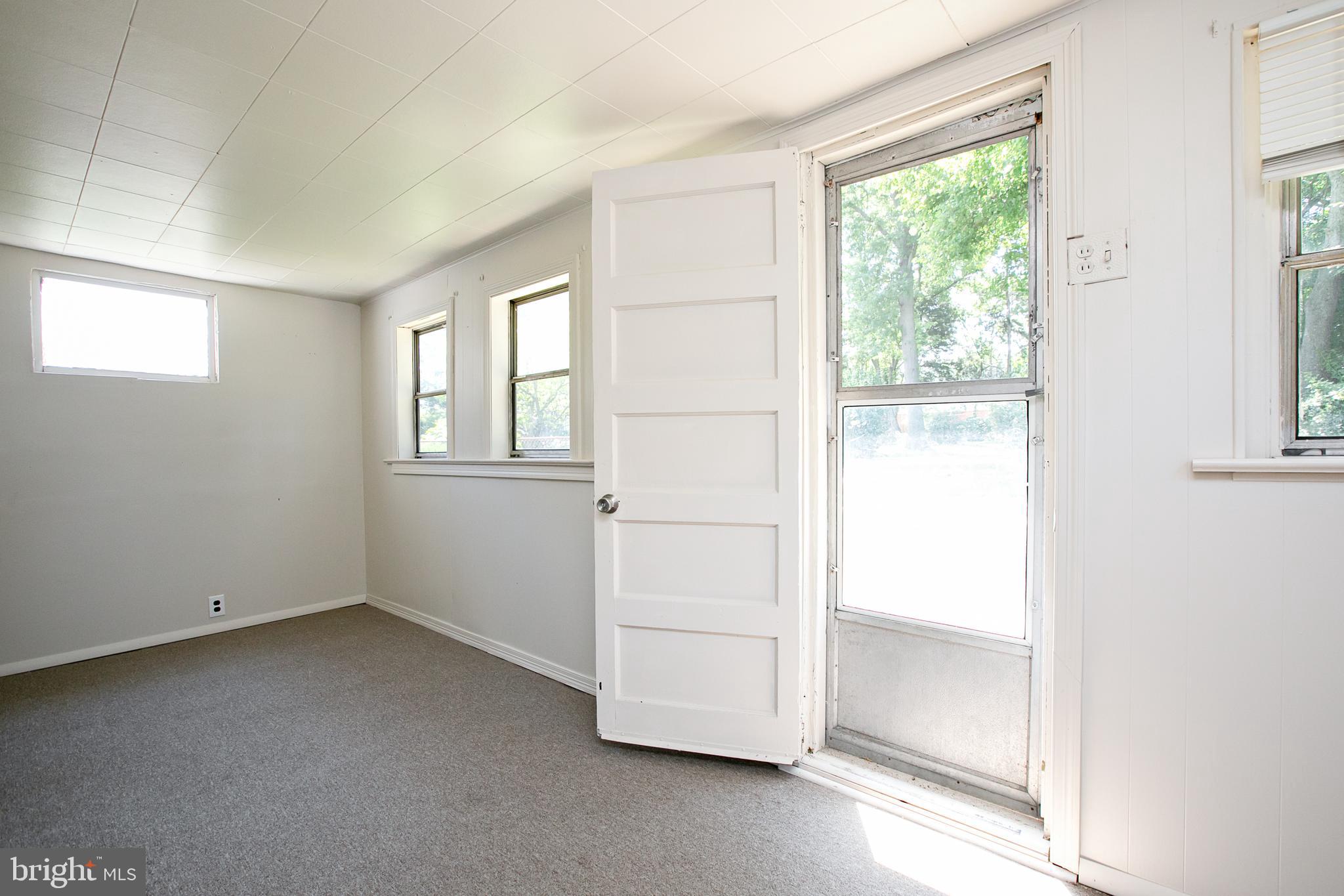 34 Valley Road Mount Ephraim, NJ 08059 - Photo 31 of 39 an empty room with windows