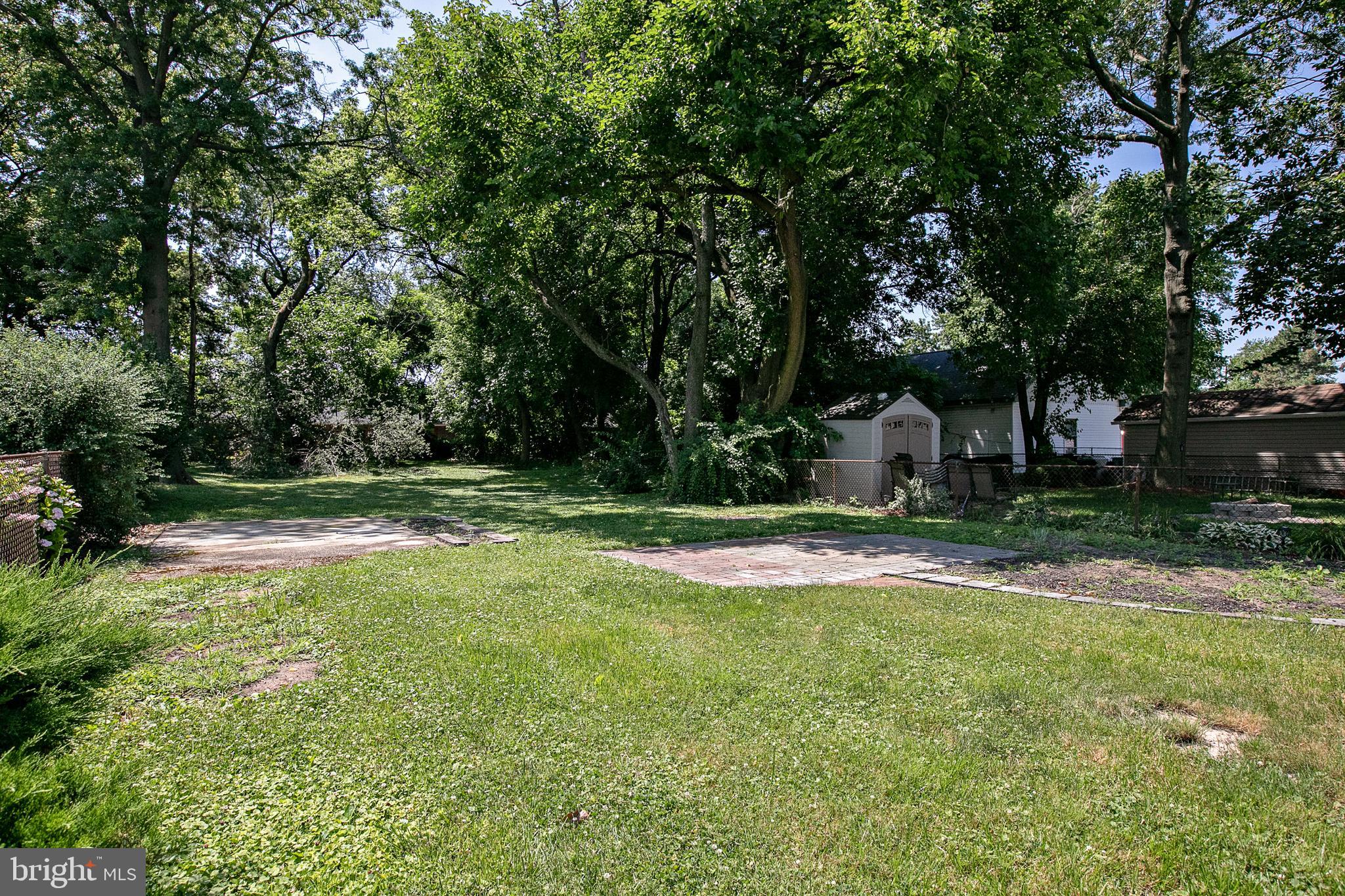 34 Valley Road Mount Ephraim, NJ 08059 - Photo 34 of 39 a view of a house with a yard
