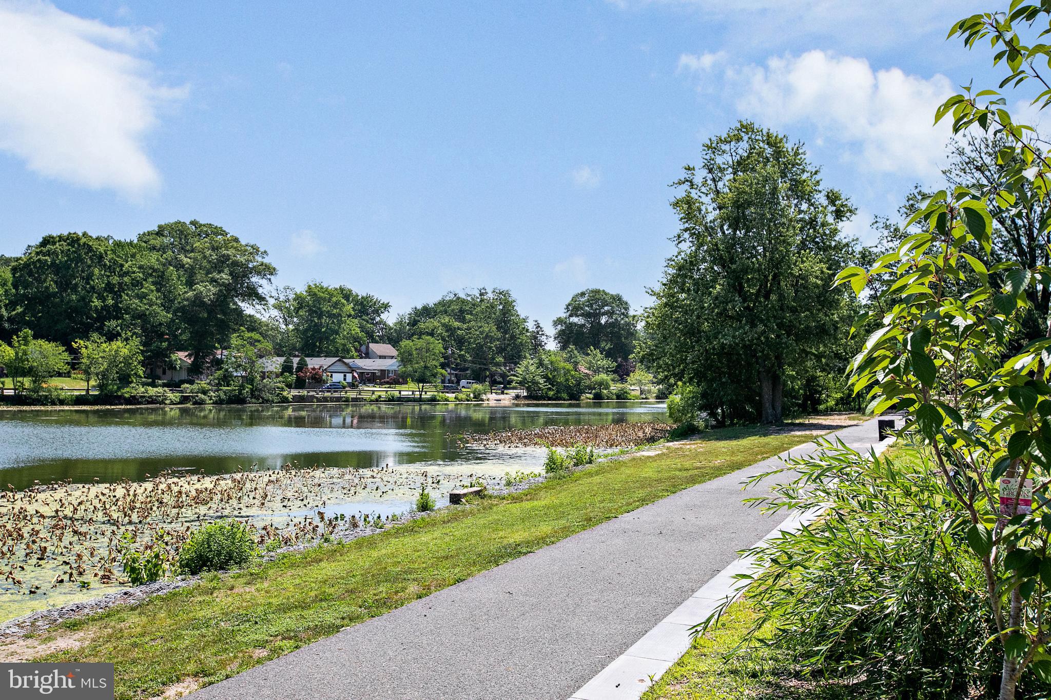 34 Valley Road Mount Ephraim, NJ 08059 - Photo 37 of 39 a view of a lake with a house in the background
