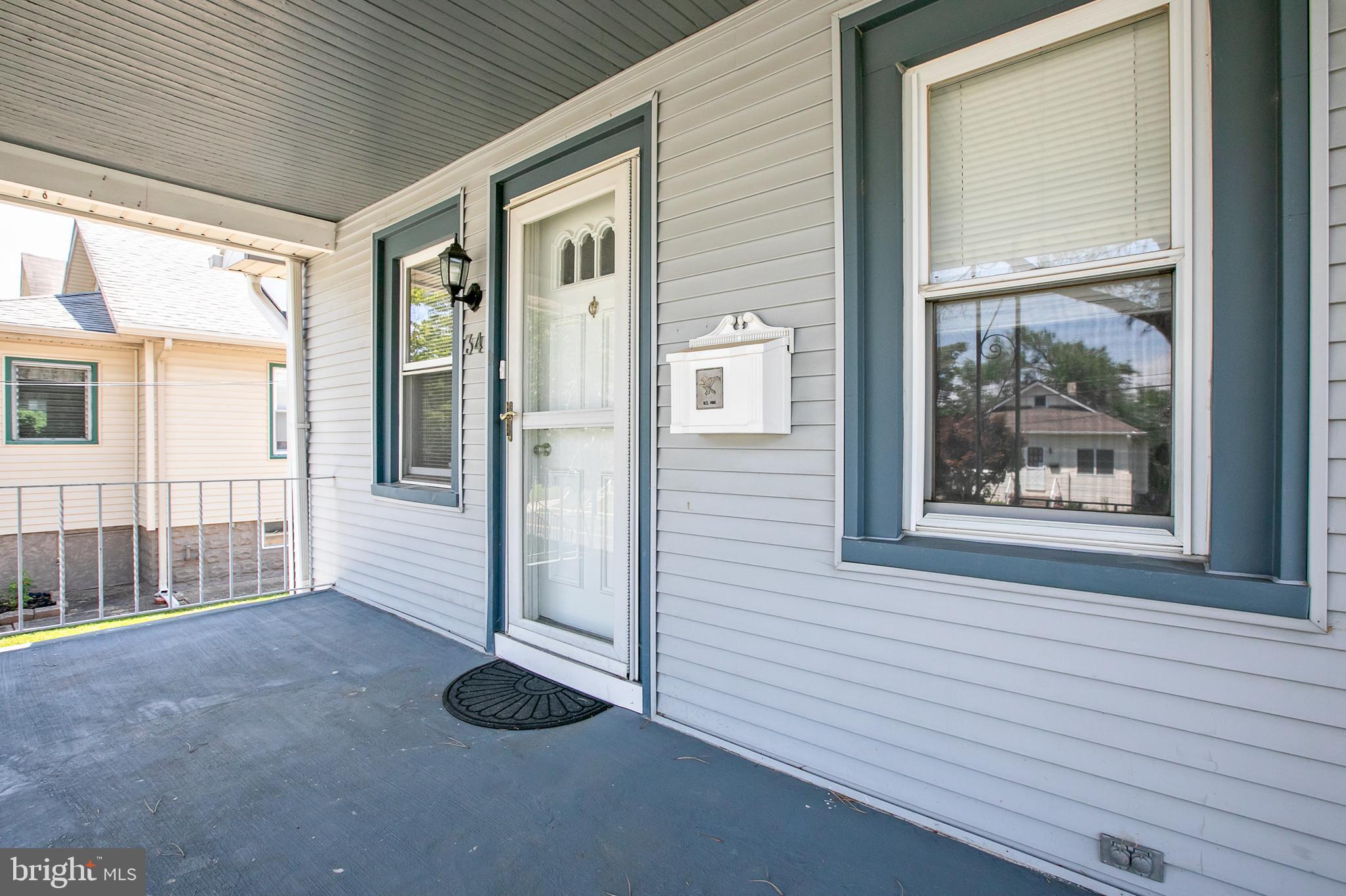 34 Valley Road Mount Ephraim, NJ 08059 - Photo 4 of 39 a view of livingroom with furniture and windows