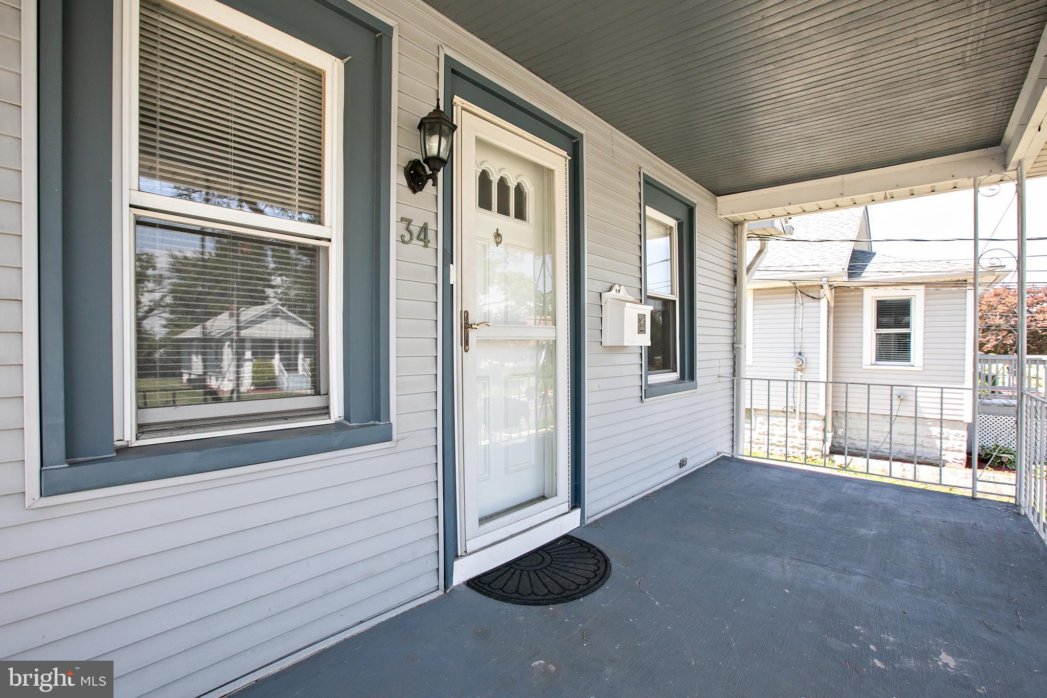 34 Valley Road Mount Ephraim, NJ 08059 - Photo 5 of 39 a view of an empty room with a window