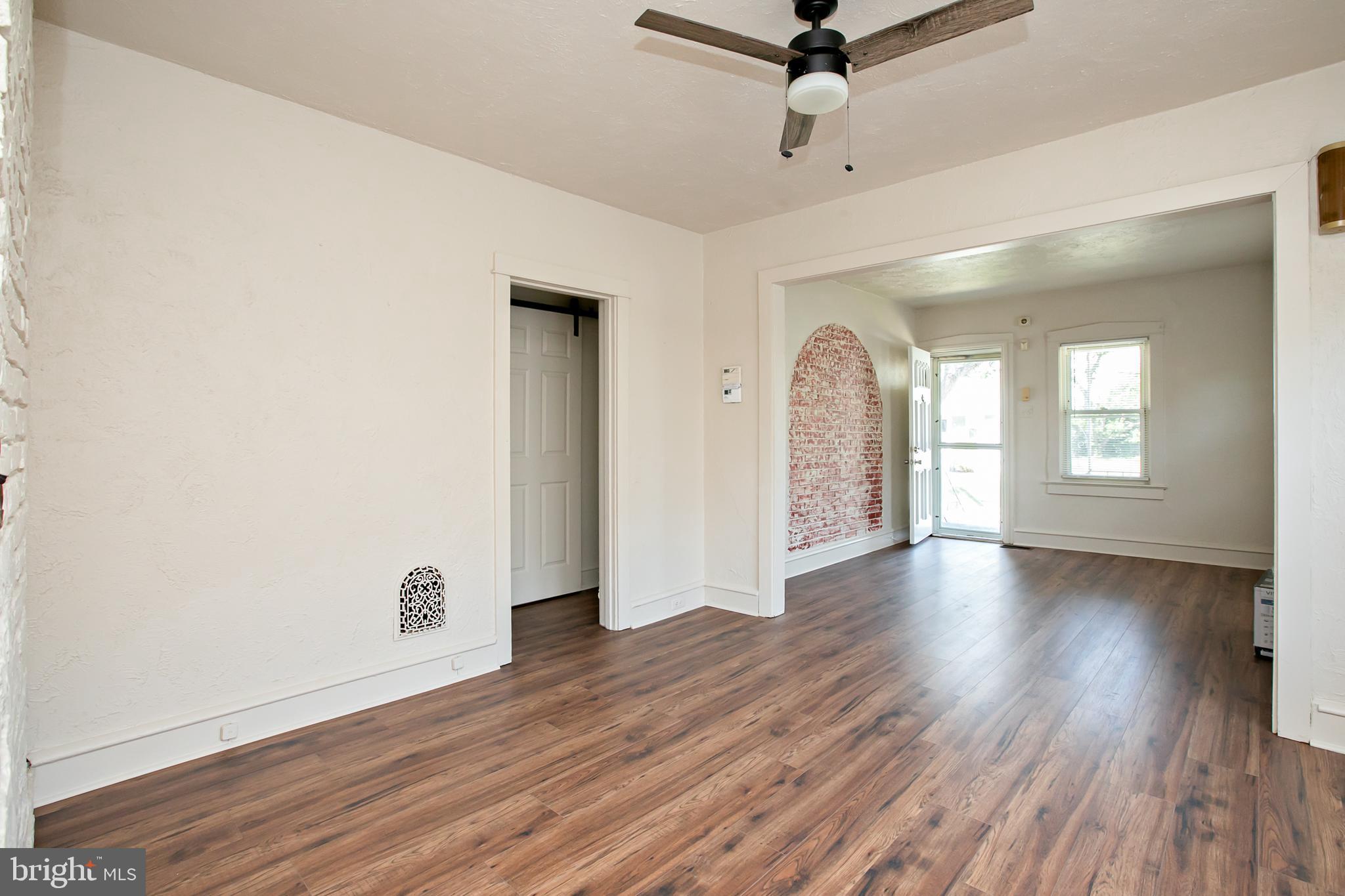 34 Valley Road Mount Ephraim, NJ 08059 - Photo 8 of 39 wooden floor in an empty room with a window