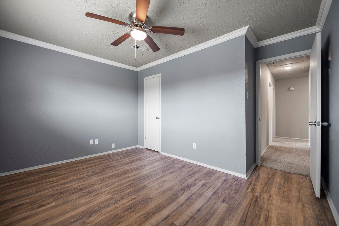 3419 Acorn Springs Lane Spring, TX 77389 - Photo 15 of 24 wooden floor in an empty room with a fan